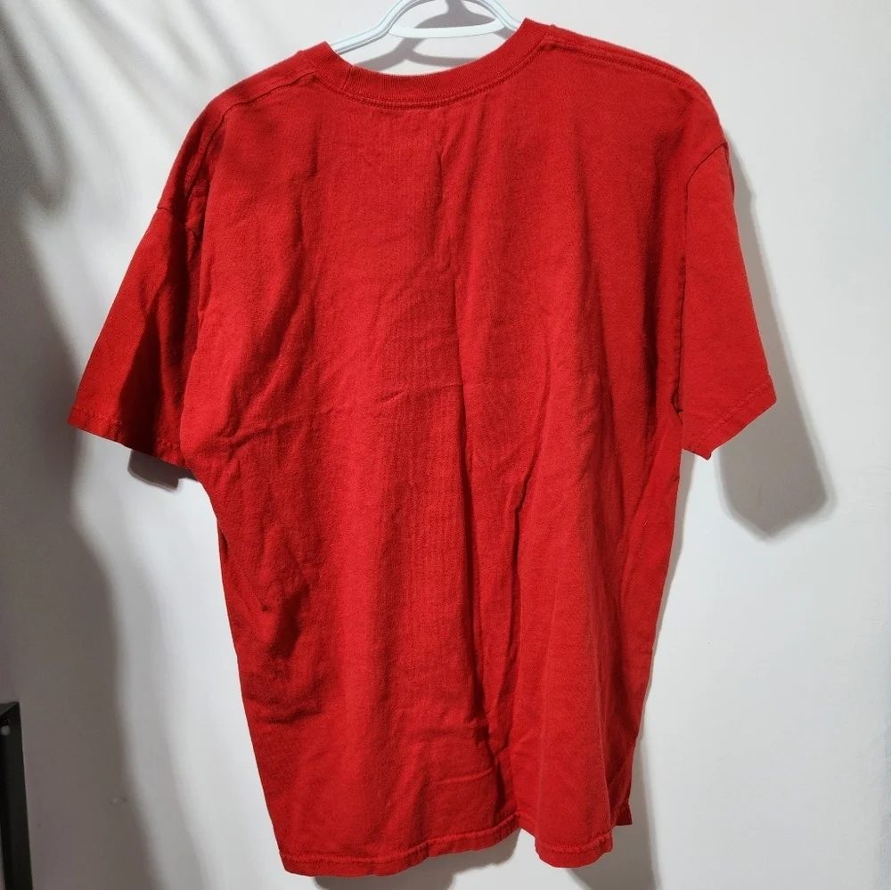 Action Apparel Graphic T-shirt - Picture 3 of 5
